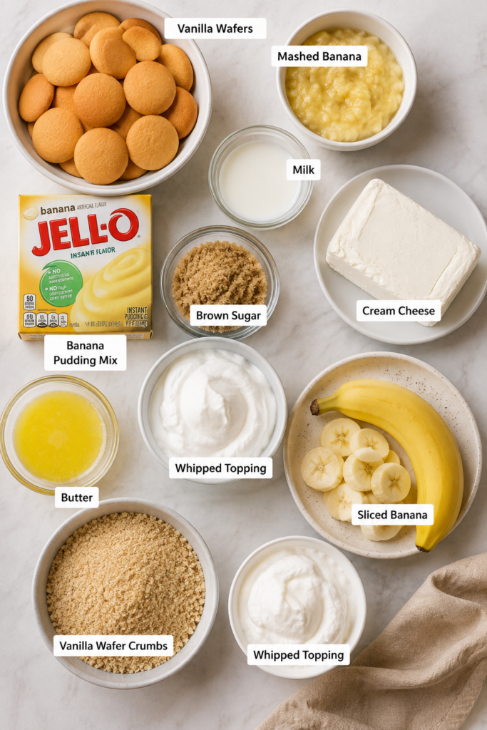 Easy no bake cheesecake made with banana pudding, cream cheese, fresh banana, and a vanilla wafer crust. The finished cheesecake is topped with whipped cream and golden vanilla wafers.