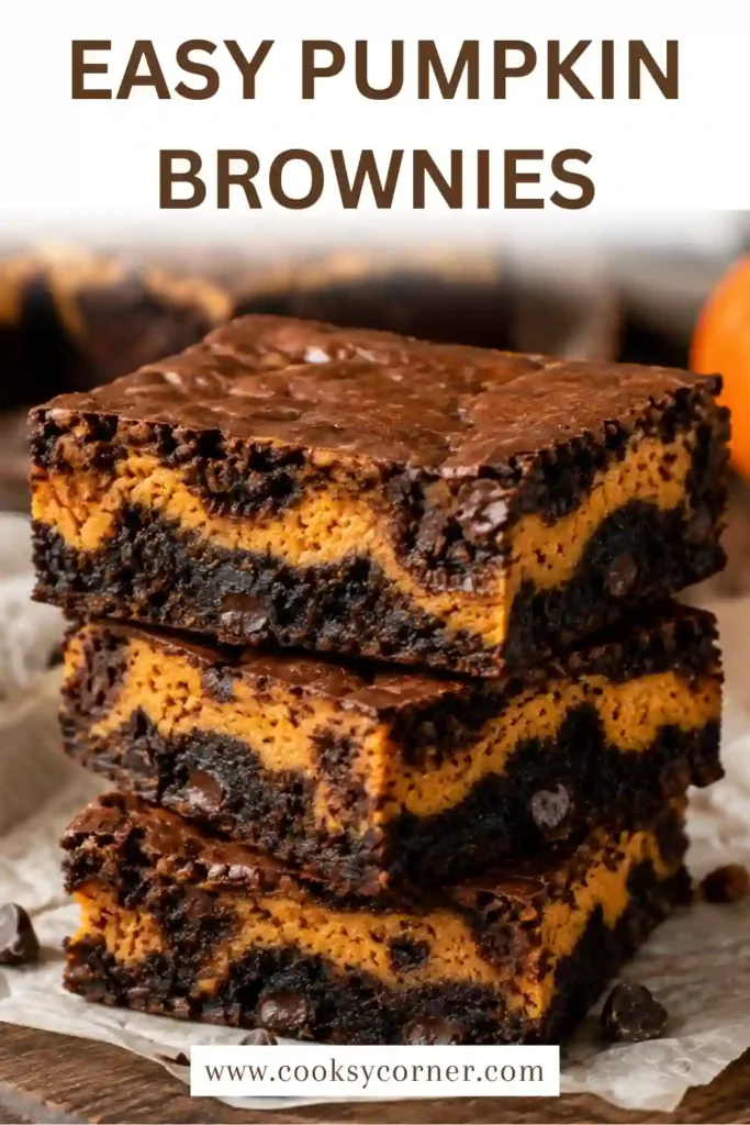 Chocolate pumpkin brownies cut into squares with visible pumpkin cream cheese swirls. These pumpkin cheesecake brownies combine fudgy chocolate with smooth, warmly spiced pumpkin filling.