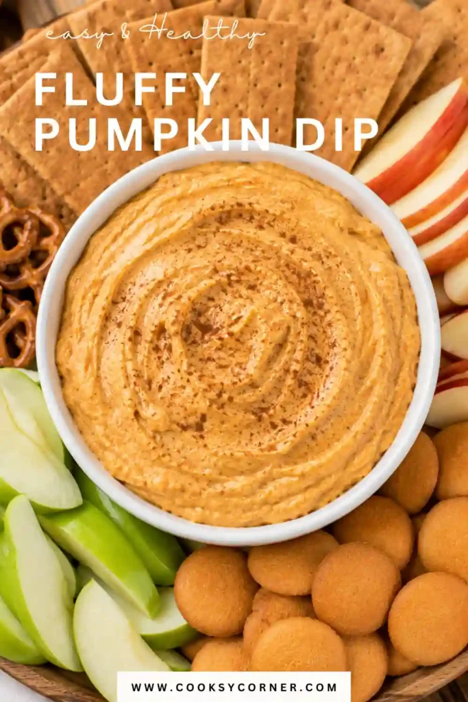 Homemade Pumpkin Dip with a creamy orange color and smooth, whipped texture. The easy fall dessert dip combines pumpkin puree with vanilla and pumpkin pie spice.