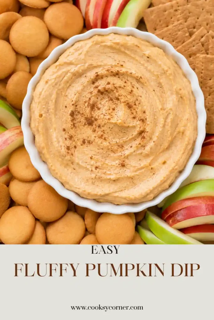 Creamy Pumpkin Dip served in a bowl with a light sprinkle of pumpkin pie spice. This easy pumpkin dip has a fluffy texture and warm fall flavor.