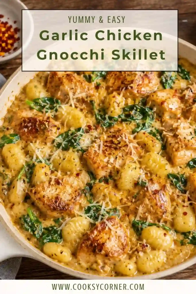 Garlic Chicken Gnocchi Skillet served with tender paprika chicken, pillowy gnocchi, mushrooms, and wilted spinach. The ingredients are coated in a creamy garlic and mozzarella sauce.
