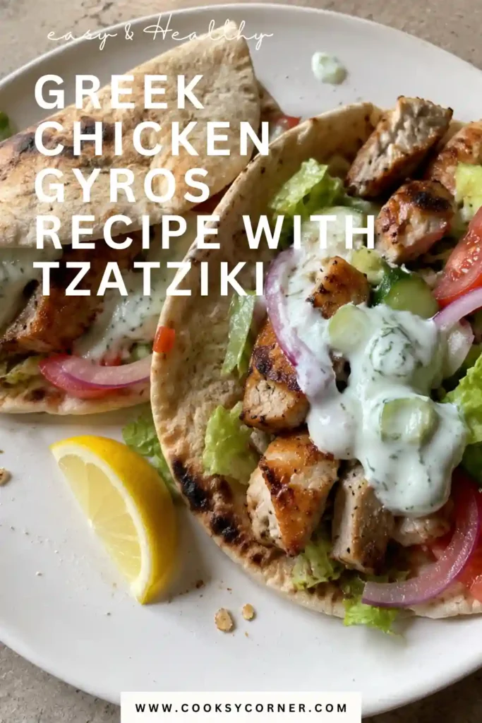 Greek Chicken Gyros Recipe with sliced golden chicken, homemade cucumber tzatziki, tomatoes, red onion, and fresh parsley inside warm pita. Lemon and oregano give the chicken bright Mediterranean-inspired flavor.
