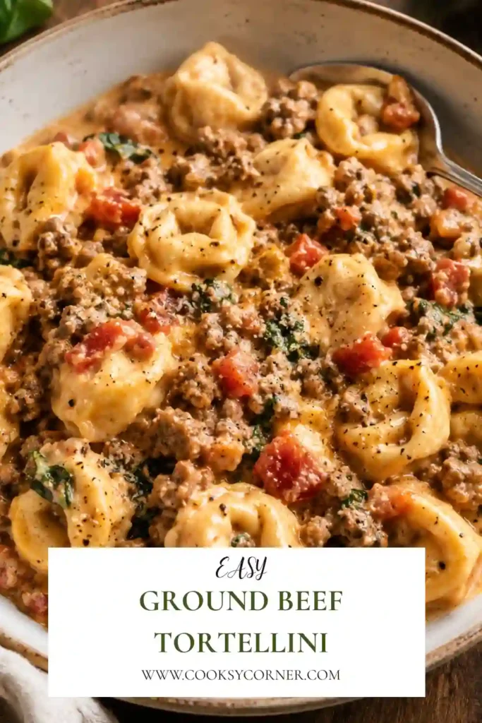 Creamy ground beef tortellini with cheese-filled pasta, tomatoes, baby spinach, and Parmesan. The tortellini is coated in a rich Italian-inspired cream sauce.