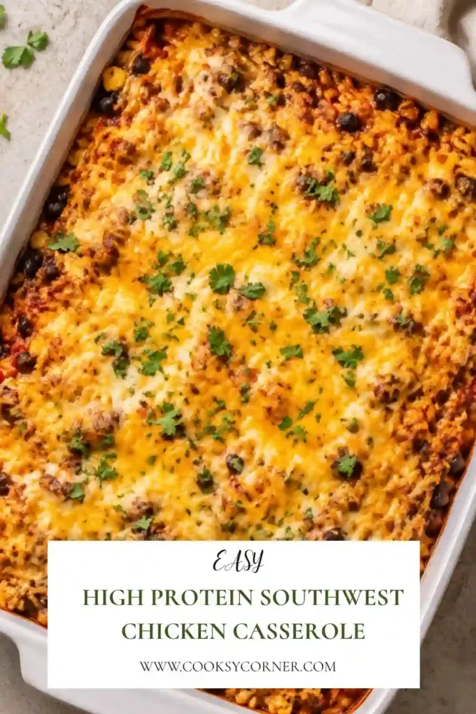 High Protein Southwest Chicken Casserole with chicken, basmati rice, black beans, corn, salsa, and melted cheddar. The colorful casserole is baked until cheesy and bubbling.