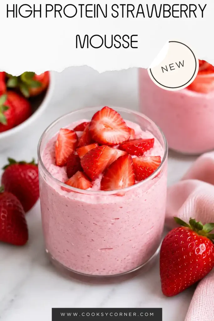Homemade healthy strawberry dessert served in a small glass with sliced fresh strawberries. This cottage cheese dessert is blended until smooth and chilled before serving.