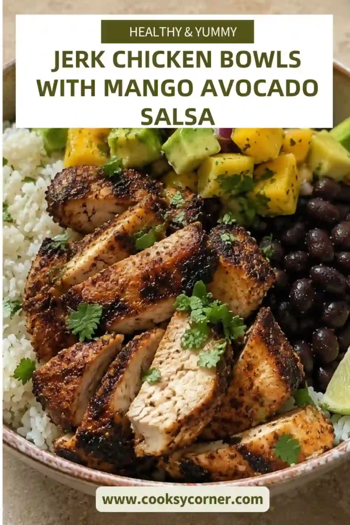Jerk Chicken Bowls served with coconut lime rice and colorful mango avocado salsa. Juicy seasoned chicken, black beans, cilantro, and fresh lime complete this hearty bowl.