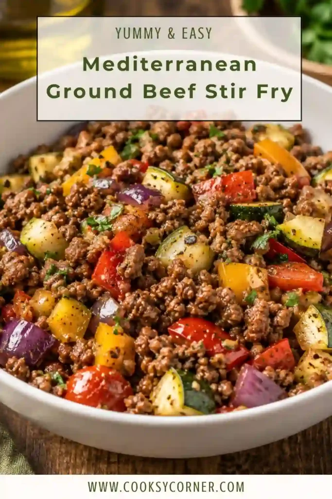 Ground beef and zucchini stir-fry with red bell peppers, juicy cherry tomatoes, onion, garlic, and Mediterranean seasonings. Fresh parsley adds a bright green garnish.