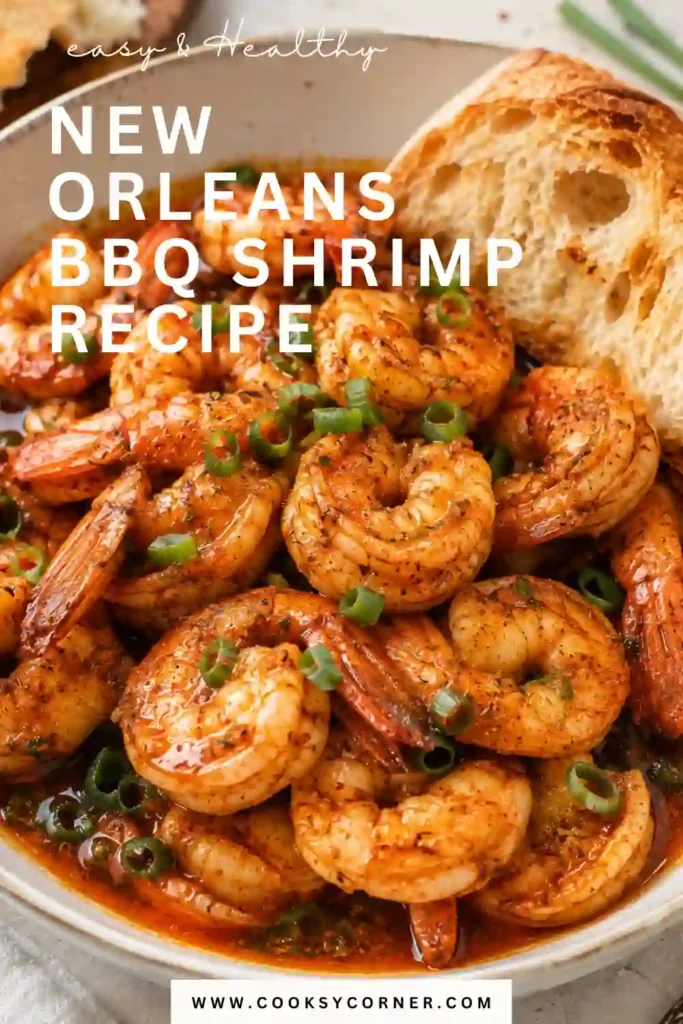 Juicy garlic butter shrimp cooked with Cajun spices and lemon for an easy New Orleans BBQ shrimp recipe. The shrimp are finished with scallions in a glossy Louisiana-style butter sauce.