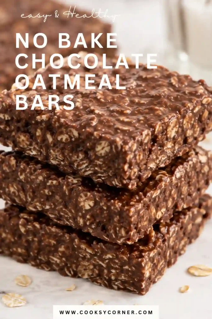 Homemade no bake oatmeal bars filled with creamy peanut butter and semisweet chocolate. The sliced oatmeal chocolate bars show distinct chewy oat and chocolate layers.