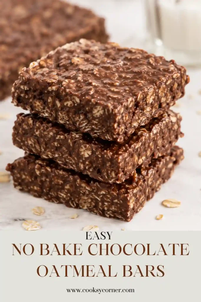 No Bake Chocolate Oatmeal Bars with chewy rolled oat layers and a creamy chocolate peanut butter filling. The chilled bars are sliced into squares for an easy no bake dessert.