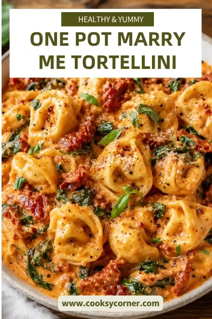 Creamy One-Pot Marry Me Tortellini with cheese tortellini coated in Parmesan sauce and topped with sun-dried tomatoes and fresh basil. A rich and comforting easy tortellini dinner.