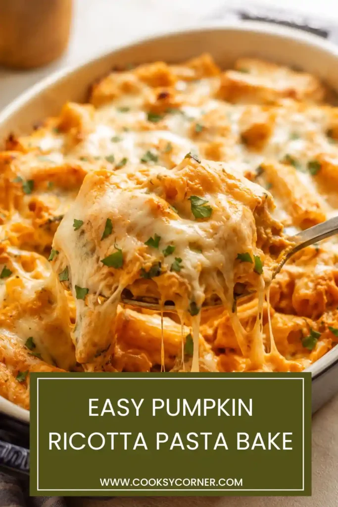 Cheesy pumpkin pasta casserole made with rigatoni, pumpkin purée, ricotta, spinach and mozzarella. The baked pasta has a creamy sauce and golden cheese topping.