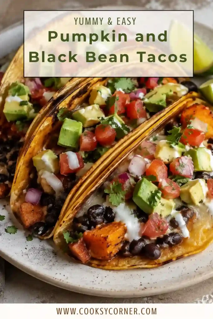 Freshly cooked Pumpkin and Black Bean Tacos with crispy corn tortillas and a creamy vegetarian filling. The tacos feature seasoned pumpkin puree, refried black beans, and gooey melted cheese.