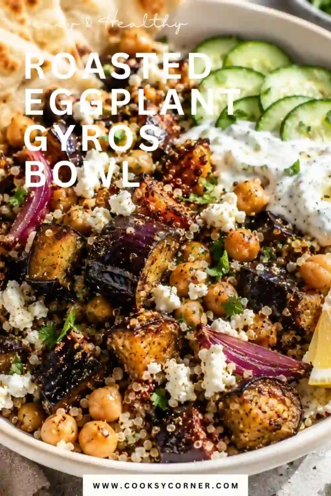 A bowl of Roasted Eggplant Gyros Bowl filled with caramelized eggplant, roasted chickpeas, quinoa, red onions, and crumbled feta cheese. This colorful Mediterranean-inspired meal is hearty, healthy, and perfect for weeknight dinners.