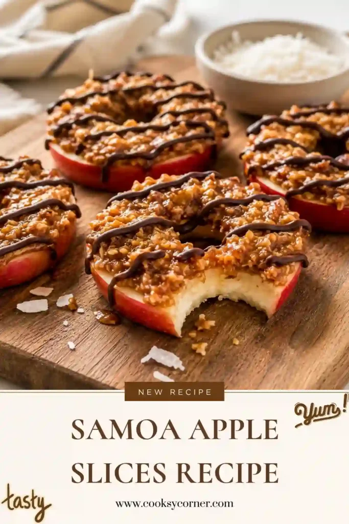 Fresh apple rings topped with a creamy almond butter coconut mixture and drizzled with melted chocolate on a serving platter.