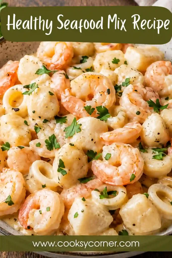 Seafood mix cooked in a creamy Parmesan sauce and served with fresh parsley in a skillet. A rich and comforting seafood dinner.