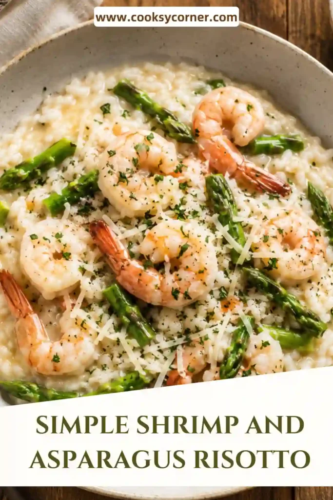 Shrimp risotto served creamy and warm with asparagus pieces, Parmesan cheese, and freshly cracked black pepper. The plump shrimp contrast with the rich, velvety arborio rice.
