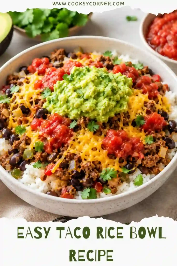 Close-up of a homemade ground beef rice bowl with seasoned taco meat, black beans, guacamole, salsa, and shredded cheese served over fluffy rice. A hearty and family-friendly Mexican-inspired dinner.