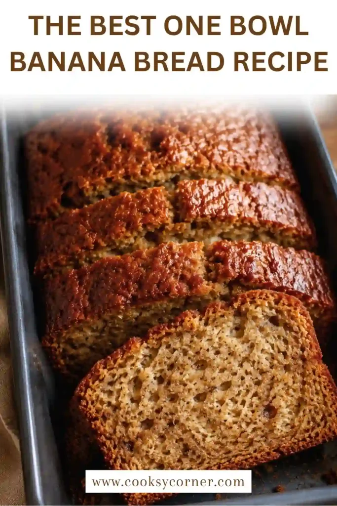 Easy one-bowl banana bread with a moist, tender crumb and warm golden crust. The homemade loaf is made with ripe bananas and can be customized with chocolate chips or walnuts.