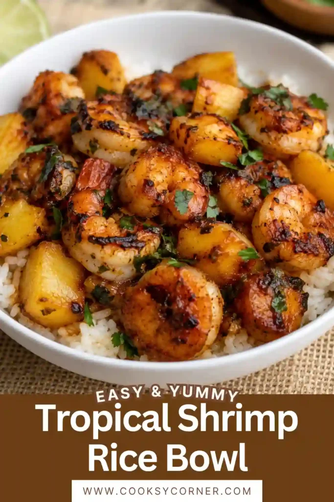 Pineapple shrimp rice bowl featuring tender shrimp and golden pineapple over fluffy jasmine rice. Fresh lime and cilantro add bright tropical flavor.