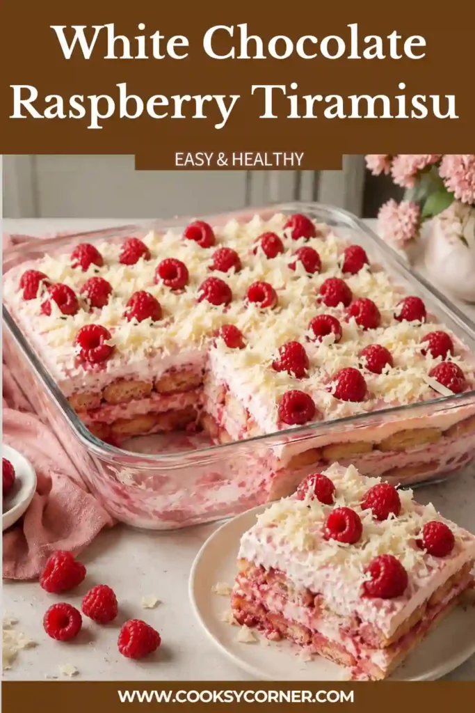 No-bake White Chocolate Raspberry Tiramisu with soft ladyfingers, homemade raspberry sauce, mascarpone cream, and white chocolate. Bright fresh raspberries top the creamy layered dessert.