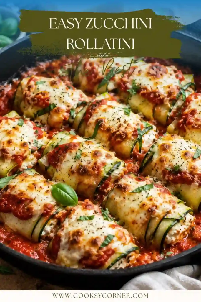 Freshly baked zucchini involtini filled with creamy ricotta and topped with golden melted cheese. Marinara sauce surrounds the tender zucchini rolls in the baking dish.