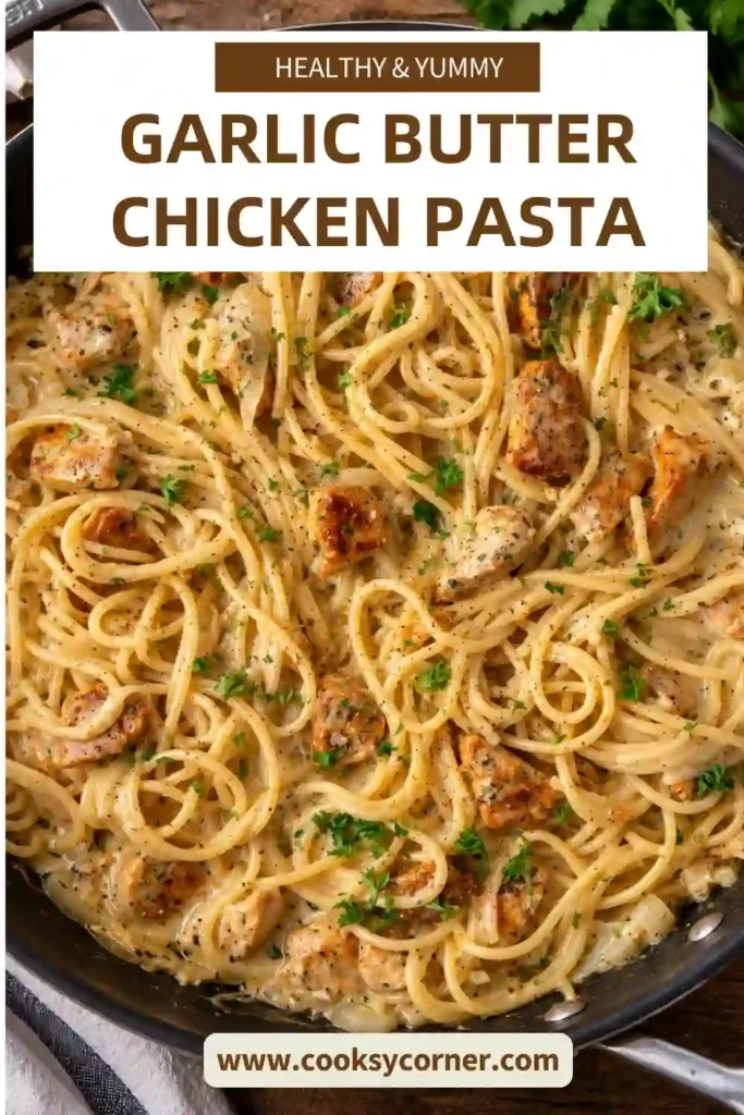 Garlic Butter Chicken Pasta served in a bowl with golden chicken pieces and spaghetti coated in creamy garlic Parmesan sauce. Fresh parsley and grated cheese finish the comforting pasta dish.