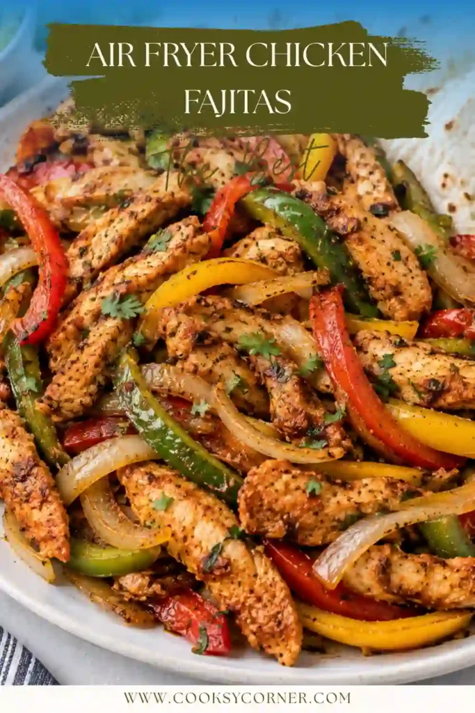 Air Fryer Chicken Fajitas served hot with lightly charred peppers, onions, and tender seasoned chicken. Warm tortillas, fresh lime, and creamy guacamole complete the meal.