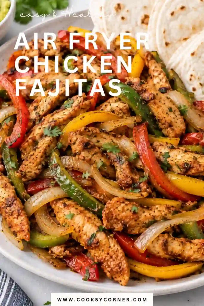 Juicy air fryer chicken and peppers seasoned with smoked paprika, cumin, chili powder, and garlic. Tender onions and colorful bell peppers create an easy chicken fajita dinner.