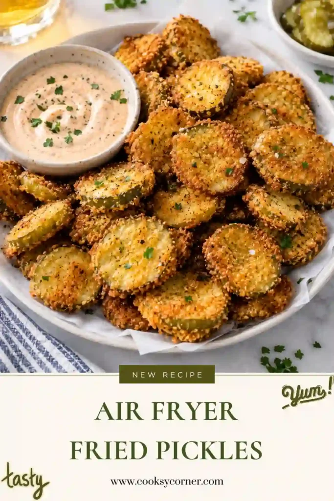 Crispy air fryer pickle chips arranged on a serving plate with a small bowl of dipping sauce. The panko coating is golden brown and crunchy around juicy dill pickle slices.