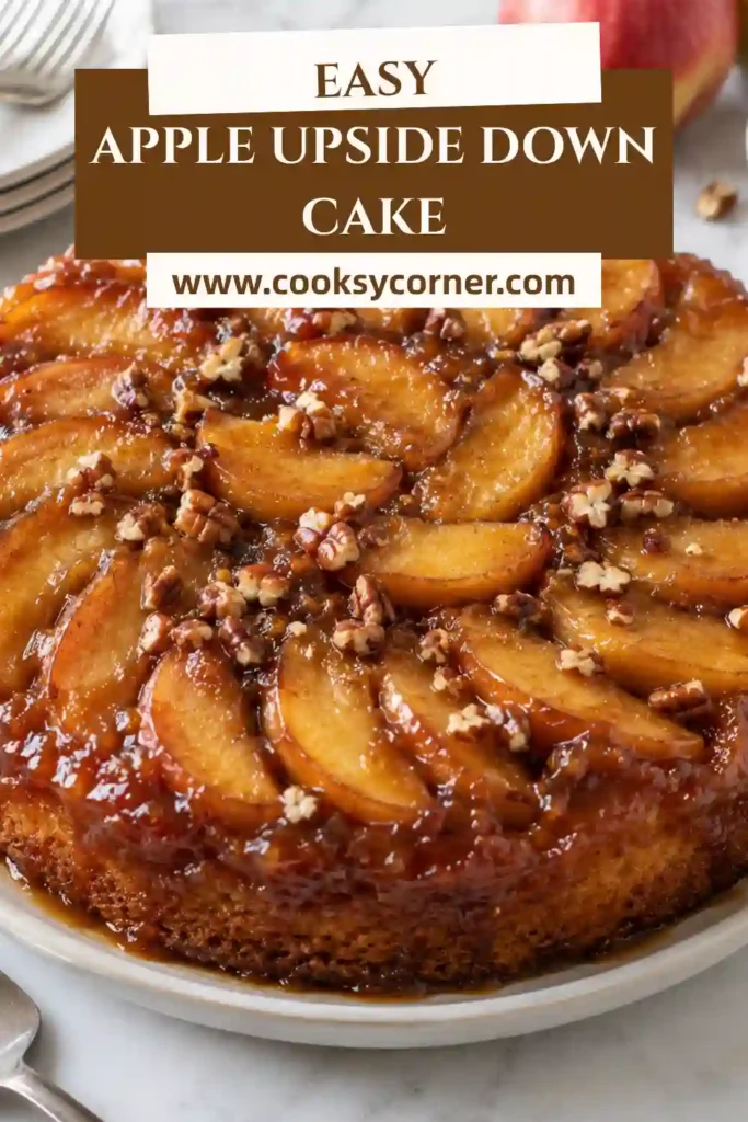 Apple Upside Down Cake topped with overlapping slices of caramelized Honeycrisp apples and glossy brown sugar topping. The tender cinnamon cake underneath has a soft golden crumb.