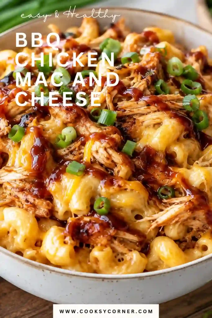 A family-style serving of BBQ chicken mac and cheese with creamy pasta and shredded barbecue chicken. The cheesy macaroni is ready to serve as a comforting, family-friendly chicken dinner.
