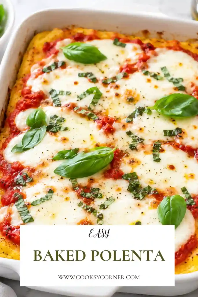 A serving of cheesy baked polenta layered with pesto, marinara, basil, and melted mozzarella. This easy polenta dinner has a creamy center and savory tomato topping.