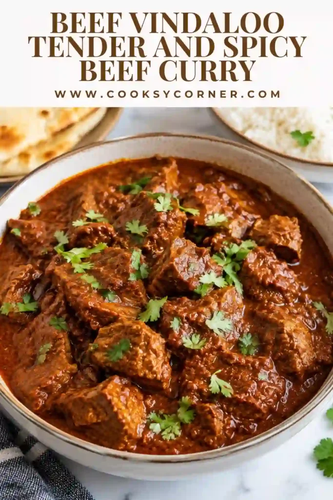 Spicy beef curry made with beef chuck, garam masala, cumin, turmeric, paprika, garlic, tomato paste, and apple cider vinegar. The tender Beef Vindaloo is served hot alongside basmati rice.