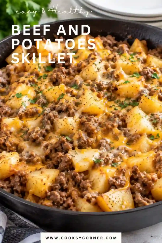 Ground beef and potatoes cooked together in a skillet with bell pepper, garlic, smoked paprika, and cheddar cheese. The finished beef potato skillet is hearty, golden, and comforting.