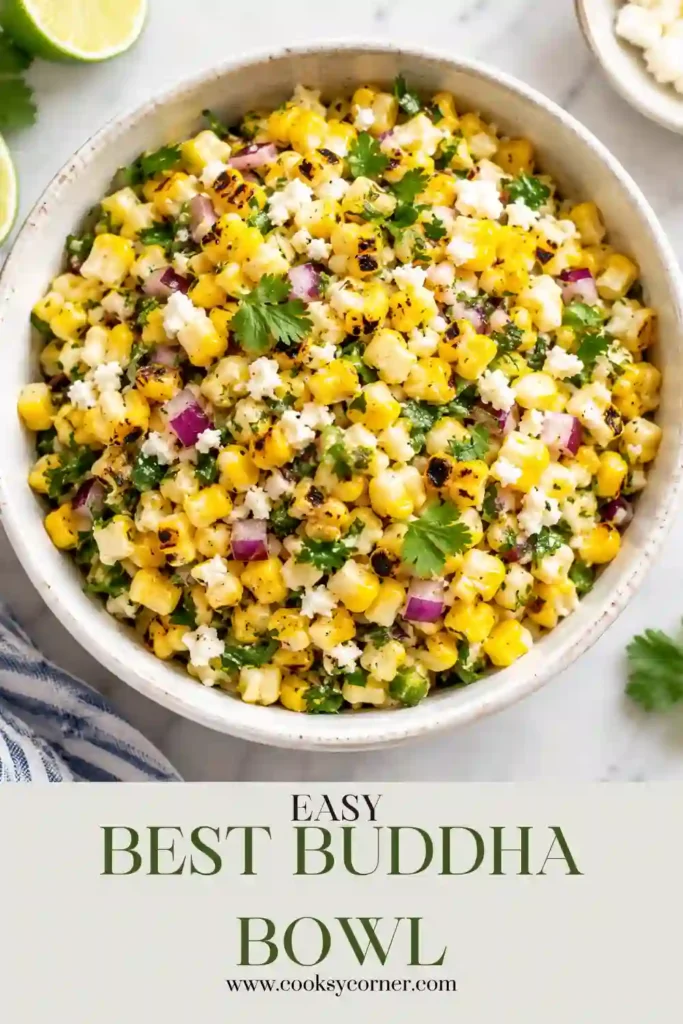 Best Buddha Bowl with roasted sweet potatoes, brown rice, chickpeas, kale, carrots, radish, red cabbage, and sauerkraut. Creamy turmeric tahini sauce and sesame seeds finish the colorful plant-based bowl.