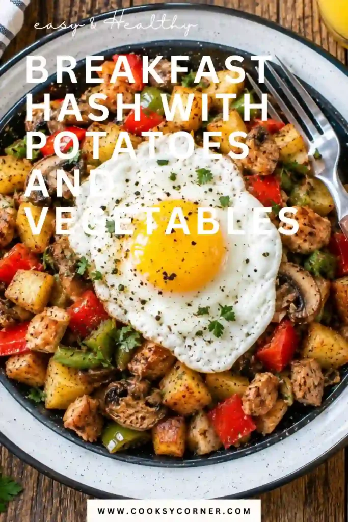 Breakfast Hash with crispy red potatoes, bell peppers, mushrooms, onions, and golden turkey ham in a skillet. A soft-cooked egg on top makes this a hearty breakfast hash with eggs.