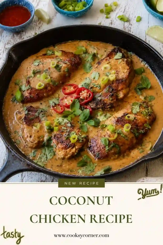 Creamy coconut chicken with tender golden chicken breasts covered in a silky coconut lime sauce. Fresh green onions, cilantro, and red pepper slices add vibrant color to the finished skillet.