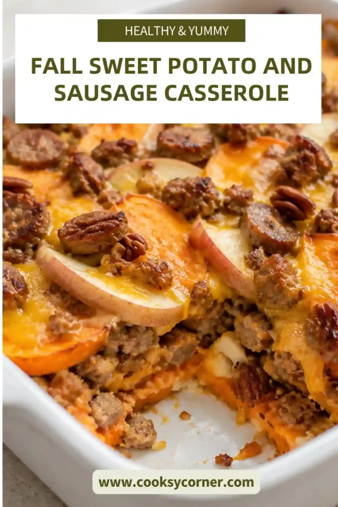 Fall Sweet Potato and Sausage Casserole layered with tender sweet potatoes, beef sausage, cinnamon apples, pecans, and melted cheddar. The baked casserole has a golden cheesy top with toasted nuts.