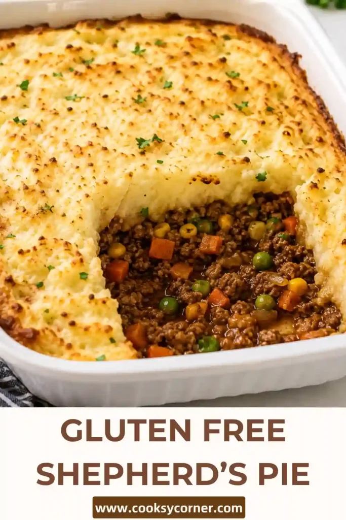 Gluten free beef shepherd's pie featuring a rich ground beef and vegetable filling topped with creamy mashed potatoes. Forked potato ridges are baked until crisp and lightly golden.