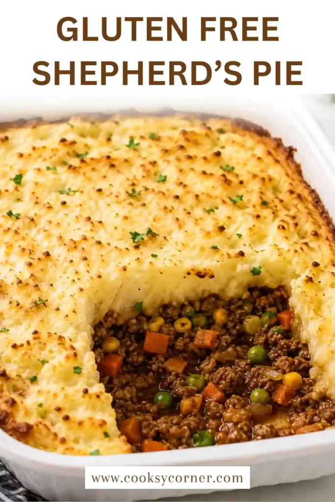 Gluten Free Shepherd’s Pie with savory ground beef, peas, carrots, and corn beneath a thick layer of golden mashed potatoes. Fresh chopped parsley adds color to the warm baked casserole.