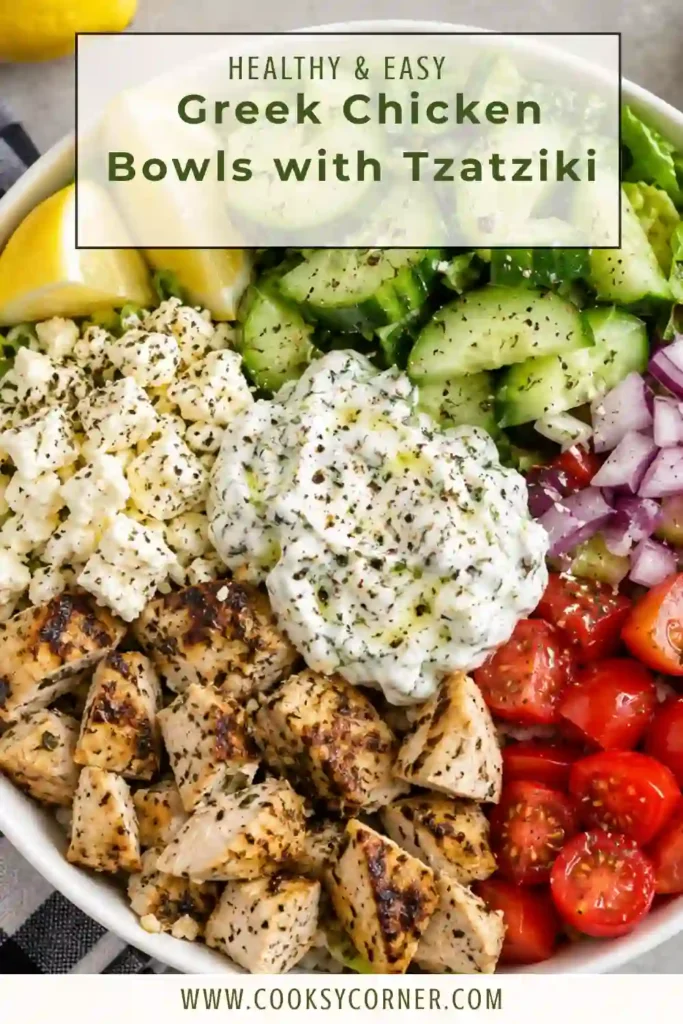 Healthy Greek Chicken Bowls with Tzatziki filled with sliced lemon-garlic chicken, rice, cucumber, tomatoes, romaine, feta, and red onion. Creamy homemade tzatziki finishes the colorful Mediterranean-inspired bowl.