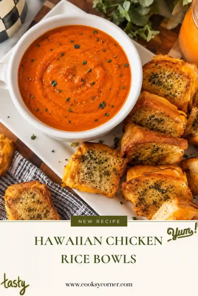 Hawaiian roll grilled cheese sliders arranged on a baking sheet with golden bread and melted cheddar. The small sandwiches have lightly browned edges and visible layers of cheese.
