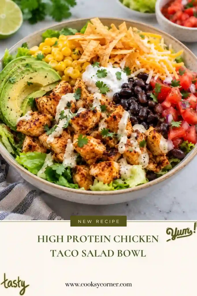Creamy Greek yogurt taco dressing served in a small bowl beside a fresh chicken taco salad. The smooth dressing combines Greek yogurt, salsa, lime juice, and taco spices for a tangy, flavorful finish.