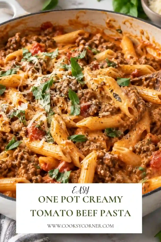 Creamy ground beef pasta served in a bowl with a velvety tomato sauce, Parmesan cheese, and fresh parsley. Short pasta captures the rich beef and tomato cream sauce in every bite.