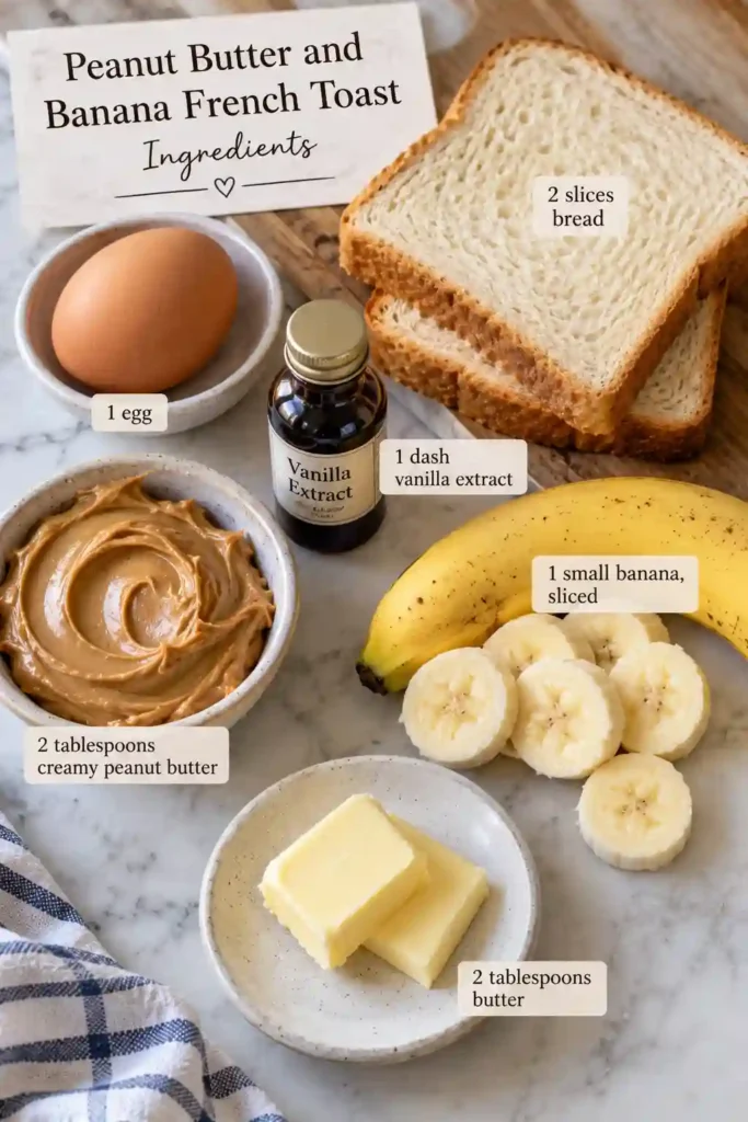 Peanut Butter and Banana French Toast cooked until golden brown and served warm on a breakfast plate. The stuffed sandwich features creamy peanut butter and sweet banana slices between two slices of buttery French toast.
