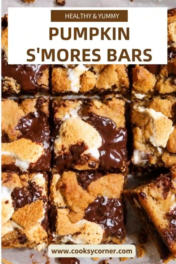 Pumpkin S'mores Bars with golden pumpkin cookie dough, toasted marshmallows, melted dark chocolate, and crunchy graham crackers. The thick dessert bars have a chewy texture and a gooey chocolate marshmallow filling.