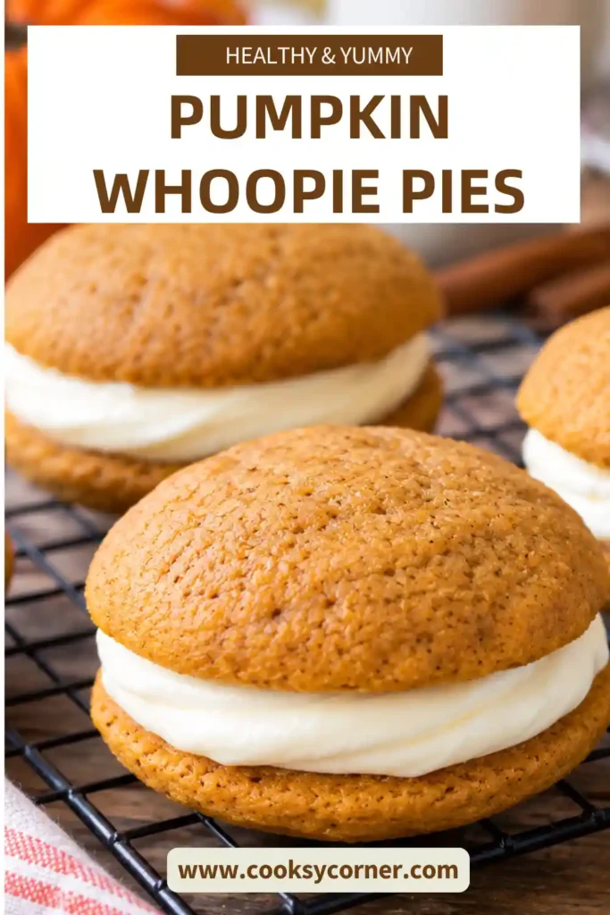 Pumpkin Whoopie Pies arranged on a serving plate with creamy frosting peeking between the soft, spiced pumpkin cookies. The cozy autumn presentation makes these homemade pumpkin desserts ideal for Thanksgiving and fall gatherings.
