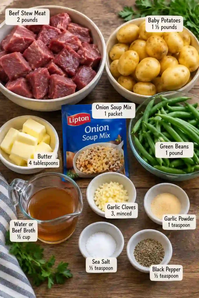 Crockpot beef bites served with buttery baby potatoes and tender green beans. This comforting beef dinner is seasoned with garlic, black pepper, and savory onion seasoning.