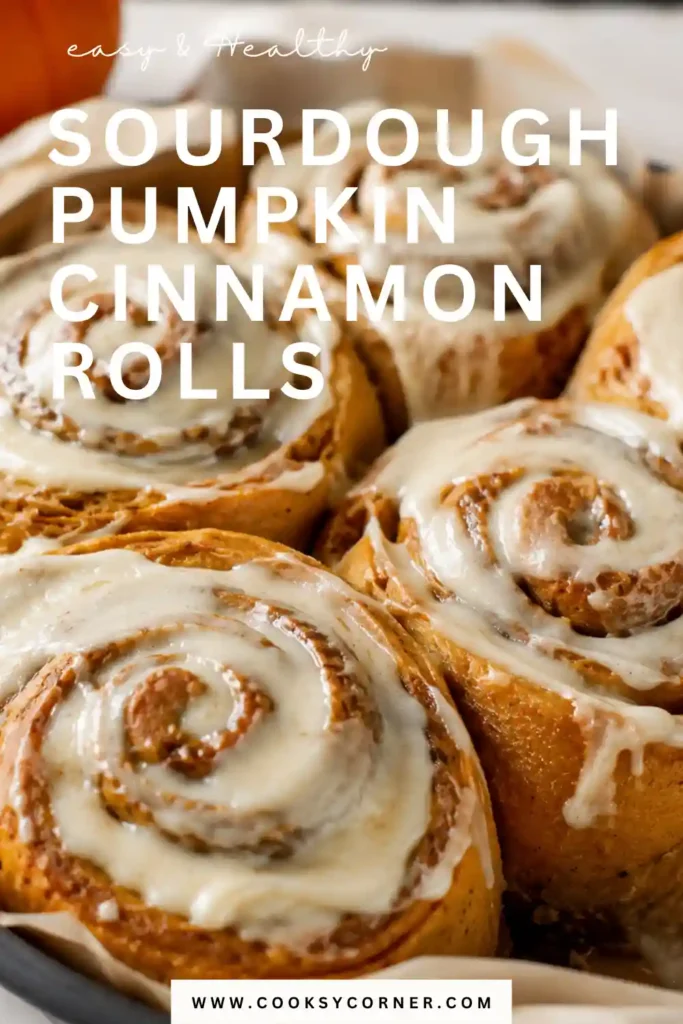 Homemade Sourdough Pumpkin Cinnamon Rolls served warm with thick vanilla cream cheese icing. Pumpkin puree gives the naturally fermented rolls a soft texture and warm golden color.